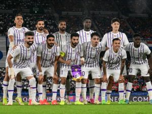 Members of Al Ain's starting side pose at the start of the AFC Champions League final first leg football match between UAE's Al Ain and Japan's Yokohama F. Marinos at Nissan Stadium in Yokohama, Kanagawa prefecture, south of Tokyo, on May 11, 2024. (Photo by Yuichi YAMAZAKI / AFP)