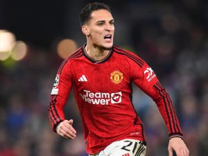 Manchester United's Brazilian midfielder #21 Antony reacts during the UEFA Champions League group A football match between Manchester United and FC Bayern Munich at Old Trafford stadium in Manchester, north west England, on December 12, 2023. (Photo by PETER POWELL / AFP)