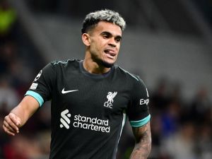 Liverpool's Colombian forward #07 Luis Diaz looks on during the UEFA Champions League 1st round day 1 football match between AC Milan and Liverpool FC at the San Siro stadium in Milan on September 17, 2024. (Photo by PIERO CRUCIATTI / AFP)