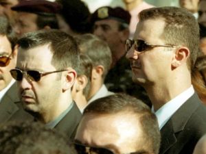 Syrian President Bashar Assad and his brother Maher Assad. (RAMZI HAIDAR/AFP/Getty Images files) Syrian President Bashar Assad and his brother Maher Assad