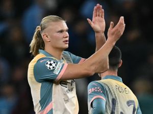 Manchester City's Norwegian striker #09 Erling Haaland applauds fans on the pitch after the UEFA Champions League, league phase football match between Manchester City and Inter Milan at the Etihad stadium, in Manchester, north-west England, on September 18, 2024 The game ended 0-0. (Photo by Paul ELLIS / AFP)
