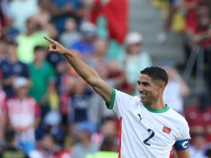 Morocco's defender #02 Achraf Hakimi celebrates scoring his team's sixth goal in the men's bronze medal football match between Egypt and Morocco during the Paris 2024 Olympic Games at the La Beaujoire Stadium in Nantes on August 8, 2024. (Photo by Alain JOCARD / AFP)