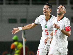 orocco's midfielder #7 Hakim Ziyech (R) celebrates with Morocco's defender #5 Nayef Aguerd after scoring his team's first goal during the Africa Cup of Nations (CAN) 2024 group F football match between Zambia and Morocco at the Stade Laurent Pokou in San Pedro on January 24, 2024. (Photo by SIA KAMBOU / AFP)