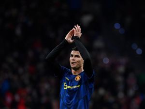 Manchester United's Portuguese forward Cristiano Ronaldo reacts at the end of the UEFA Champions League football match between Atletico de Madrid and Manchester United at the Wanda Metropolitano stadium in Madrid on February 23, 2022. (Photo by OSCAR DEL POZO / AFP)