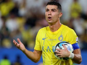 Nassr's Portuguese forward #07 Cristiano Ronaldo reacts during the Saudi Pro League football match between Al-Ittihad and Al-Nassr at the King Saud University Stadium in Riyadh on May 27, 2024. (Photo by Fayez NURELDINE / AFP)
