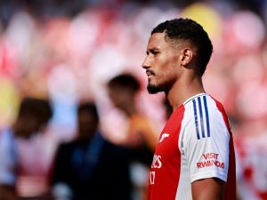 Arsenal's French defender #02 William Saliba reacts following the pre-season friendly football match for the Emirates Cup final between Arsenal and and Lyon, at the Emirates Stadium in London on August 11, 2024. (Photo by BENJAMIN CREMEL / AFP)