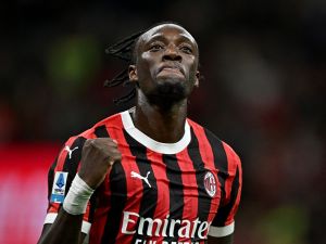 AC Milan's British forward #90 Tammy Abraham celebrates scoring his team's fourth goal during the Italian Serie A football match between AC Milan and Venezia FC at the San Siro Stadium in Milan, on September 14, 2024. (Photo by Gabriel BOUYS / AFP)
