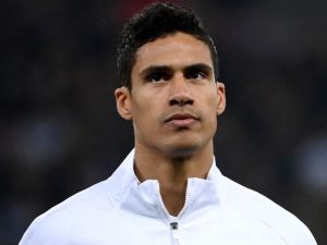 France's defender Raphael Varane listen to the nation anthem during the friendly football match between France and South Africa at the Pierre-Mauroy Stadium in Villeneuve d'Ascq, near Lille, northern France, on March 29, 2022. (Photo by FRANCK FIFE / AFP)