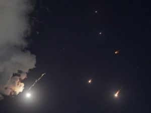 Iran launches dozens of missiles, sirens sound across Israel