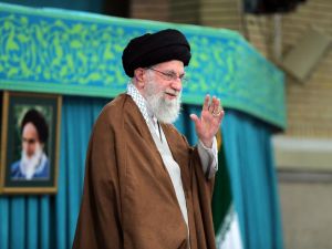A handout picture provided by the office of Iran's Supreme Leader Ayatollah Ali Khamenei on October 27, 2024, shows him waving before a meeting in Tehran. (Photo by KHAMENEI.IR / AFP) Iran's Supreme Leader Ayatollah Ali Khamenei