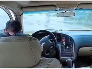 Chinese man inside his car falls into a river. (Social media) Chinese man