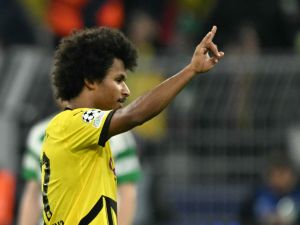 Dortmund's German forward #27 Karim Adeyemi celebrates scoring his team's fifth goal 5:1 during the UEFA Champions League football match between Borussia Dortmund and Celtic in Dortmund, western Germany on October 1, 2024. (Photo by INA FASSBENDER / AFP)