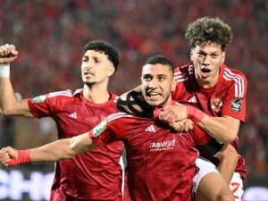 Ahly's players celebrate their team's first goal during the second leg of the CAF Champions League final football match between Egypt's Al-Ahly Tunis' Esperance Sportive de Tunis at the Cairo International stadium on May 25, 2024. (Photo by Khaled DESOUKI / AFP)