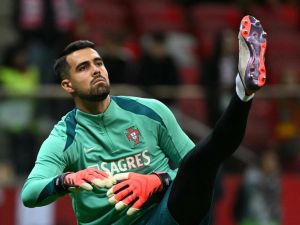 Portugal's goalkeeper #01 Diogo Costa warms up prior to the UEFA Nations League, League A Group A1 football match Poland vs Portugal at the National Stadium in Warsaw, Poland on October 12, 2024. (Photo by Sergei GAPON / AFP)