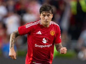 Victor Lindelöf #2 of Manchester United plays against Liverpool during their pre-season friendly match at Williams-Brice Stadium on August 03, 2024 in Columbia, South Carolina. Jacob Kupferman/Getty Images/AFP (Photo by Jacob Kupferman / GETTY IMAGES NORTH AMERICA / Getty Images via AFP)