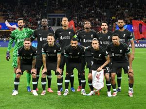 Liverpool FC's players pose for photographers prior the UEFA Champions League 1st round day 1 football match between AC Milan and Liverpool FC at the San Siro stadium in Milan on September 17, 2024. (Photo by Piero Cruciatti / AFP)