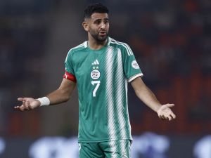Algeria's forward #7 Riyad Mahrez reacts during the Africa Cup of Nations (CAN) 2024 group D football match between Mauritania and Algeria at Stade de la Paix in Bouake on January 23, 2024. (Photo by KENZO TRIBOUILLARD / AFP)