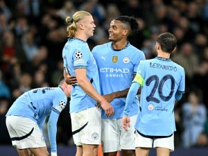 Manchester City's Norwegian striker #09 Erling Haaland (2L) celebrates scoring the team's second goal during the UEFA Champions League football match between Manchester City and Sparta Prague at the Etihad Stadium in Manchester, north west England, on October 23, 2024. (Photo by Oli SCARFF / AFP)