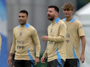Argentina's forward Lionel Messi (C) gestures during a training session in Ezeiza, Buenos Aires province, on October 14, 2024, on the eve of the FIFA World Cup 2026 qualifier football match against Bolivia. (Photo by JUAN MABROMATA / AFP)
