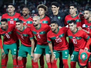 Morocco's players pose for a team photo before the international friendly football match between Morocco and Angola at Adrar Stadium in Agadir, Morocco, on March 22, 2024. (Photo by FADEL SENNA / AFP)