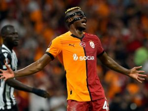 Galatasaray's Nigerian forward #45 Victor Osimhen reacts during the UEFA Europa League 1st round day 1 football match between Galatasaray SK and PAOK FC at the Ali Sami Yen Sports Complex in Sisli, near Istanbul, on September 25, 2024. (Photo by Yasin AKGUL / AFP)