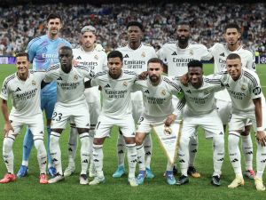 Real Madrid's players pose for a team picture before the start of during the UEFA Champions League 1st round day 1 football match between Real Madrid CF and Stuttgart VFB at the Santiago Bernabeu stadium in Madrid on September 17, 2024. (Photo by Thomas COEX / AFP)