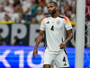 Germany's defender #04 Jonathan Tah reacts after conceding the 1-0 goal during the UEFA Euro 2024 Group A football match between Switzerland and Germany at the Frankfurt Arena in Frankfurt am Main on June 23, 2024. (Photo by Tobias SCHWARZ / AFP)