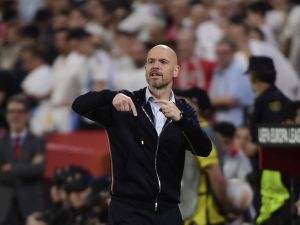 Manchester United's Dutch manager Erik ten Hag gestures during the UEFA Europa league quarter final second Leg football match between Sevilla and Manchester United at the Ramon Sanchez-Pizjuan stadium in Seville on April 20, 2023. (Photo by CRISTINA QUICLER / AFP)