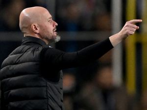 Manchester United's Dutch coach Erik Ten Hag gives instructions to his players during the UEFA Europa League, 1st round day 3 football match between Fenerbahce SK and Manchester United at the Sukru Saracoglu Stadium in Istanbul on October 24, 2024. (Photo by Ozan KOSE / AFP)