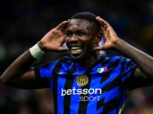 Inter Milan's French forward #09 Marcus Thuram celebrates after scoring his team's third goal during the Italian Serie A football match between Inter Milan and Torino at San Siro Stadium in Milan on October 5, 2024. (Photo by Piero CRUCIATTI / AFP)