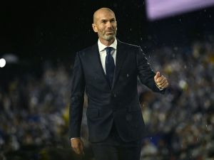 Former French football player Zinedine Zidane arrives on stage during the opening ceremony of the Paris 2024 Olympic Games in Paris on July 26, 2024. (Photo by Loic VENANCE / POOL / AFP)