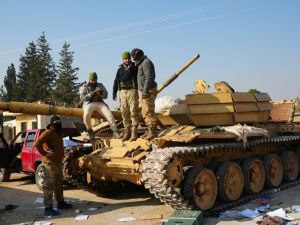 Syrian opposition forces capture Aleppo neighborhoods and strategic city in Idlib