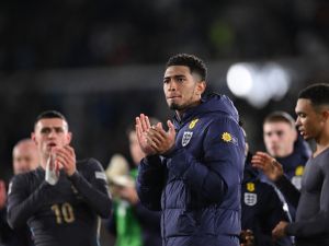 England's midfielder #08 Jude Bellingham (C) reacts at the end of the UEFA Nations League, League B Group B2 football match Finland vs England at the Olympic Stadium in Helsinki, Finland, on October 13, 2024. (Photo by Jonathan NACKSTRAND / AFP)