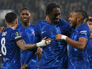 Chelsea's French defender #02 Axel Disasi (2R) celebrates scoring the team's third goal with Chelsea's French striker #18 Christopher Nkunku during the UEFA Europa Conference League, League Stage football match between Chelsea and FC Noah at Stamford Bridge in London on November 7, 2024. (Photo by Glyn KIRK / AFP)