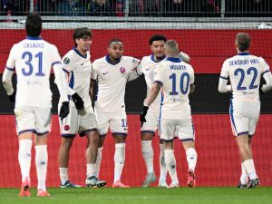 Chelsea's French midfielder #18 Christopher Nkunku (3rdR) celebrates with teammates after he scored the opening goal during the UEFA Conference League football match between 1 FC Heidenheim and Chelsea FC in Heidenheim, Germany on November 28, 2024. (Photo by THOMAS KIENZLE / AFP)