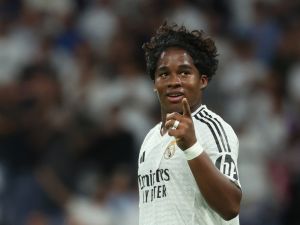 Real Madrid's Brazilian forward #16 Endrick celebrates after scoring his team's third goal during the UEFA Champions League 1st round day 1 football match between Real Madrid CF and Stuttgart VFB at the Santiago Bernabeu stadium in Madrid on September 17, 2024. (Photo by Pierre-Philippe MARCOU / AFP)