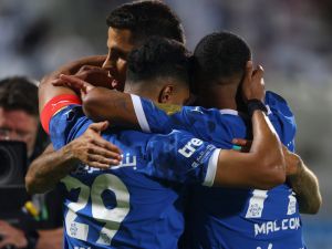 Hilal's Saudi midfielder #29 Salem al-Dawsari celebrates scoring the opener with temmates during the Saudi Pro League football match between Al-Hilal and al-Riyadh at the Prince Faisal bin Fahd Sports City in Riyadh on September 14, 2024. (Photo by Fayez NURELDINE / AFP)
