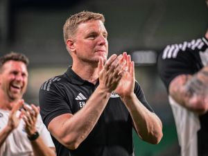 Newcastle United's head coach Eddie Howe (C) celebrates team's victory after an international club friendly football match between Newcastle United and Urawa Red Diamonds at the Saitama Stadium 2002 in Saitama on July 31, 2024. (Photo by Yuichi YAMAZAKI / AFP)
