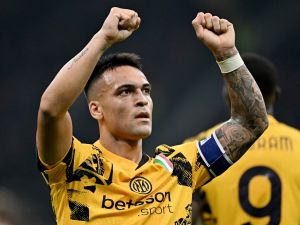 Inter Milan's Argentine forward #10 Lautaro Martinez celebrates scoring his team's first goal during the Italian Serie A football match between Inter Milan and Venezia FC at San Siro stadium in Milan, on November 3, 2024. (Photo by GABRIEL BOUYS / AFP)