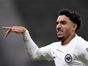 Frankfurt's Egyptian forward #07 Omar Marmoush celebrates scoring the 1-0 opening goal during the UEFA Europa League Group Matchday 4 football match between Eintracht Frankfurt and Slavia Prague in Frankfurt am Main, on November 7, 2024. (Photo by Kirill KUDRYAVTSEV / AFP)