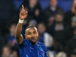 Chelsea's French striker #18 Christopher Nkunku celebrates scoring the team's seventh goal during the UEFA Europa Conference League, League Stage football match between Chelsea and FC Noah at Stamford Bridge in London on November 7, 2024. (Photo by Glyn KIRK / AFP)