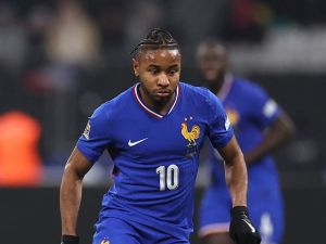 France's forward #10 Christopher Nkunku controls the ball during attends the UEFA Nations League, League A Group A2 football match between France and Israel at the Stade de France stadium in Saint-Denis, in the northern outskirts of Paris, on November 14, 2024. (Photo by FRANCK FIFE / AFP)