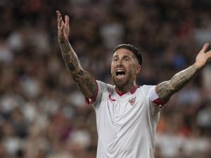Sevilla's Spanish defender #4 Sergio Ramos reacts during the Spanish league football match between Sevilla FC and FC Barcelona at the Ramon Sanchez Pizjuan stadium in Seville on May 26, 2024. (Photo by JORGE GUERRERO / AFP)