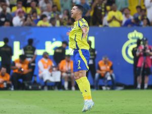 Nassr's Portuguese forward #07 Cristiano Ronaldo celebrates scoring his team's first goal during the Saudi Pro League football match between Al-Nassr and Al-Orobah at Al-Awwal Park in Riyadh on October 5, 2024. (Photo by Fayez NURELDINE / AFP)