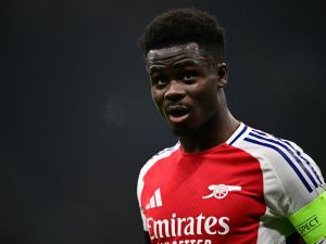 Arsenal's English midfielder #07 Bukayo Saka looks on during the UEFA Champions League football match between Inter Milan and Arsenal at the San Siro stadium in Milan on November 6, 2024. (Photo by Marco BERTORELLO / AFP)