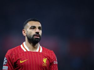Liverpool's Egyptian striker #11 Mohamed Salah reacts during the UEFA Champions League football match between RB Leipzig and Liverpool FC in Leipzig, eastern Germany on October 23, 2024. (Photo by Ronny Hartmann / AFP)