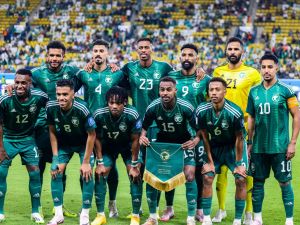 Saudi Arabia's starting eleven pose for the group picture before the 2026 FIFA World Cup AFC qualifiers football match between Saudi Arabia and Jordan at al-Awwal Stadium in Riyadh on June 11, 2024. (Photo by Fayez NURELDINE / AFP)