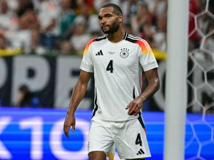 Germany's defender #04 Jonathan Tah reacts after conceding the 1-0 goal during the UEFA Euro 2024 Group A football match between Switzerland and Germany at the Frankfurt Arena in Frankfurt am Main on June 23, 2024. (Photo by Tobias SCHWARZ / AFP)