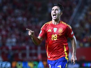 Spain's midfielder #18 Martin Zubimendi celebrates scoring the opening goal during the UEFA Nations League, league A group 4 football match between Spain and Denmark at Nueva Condomina stadium in Murcia, on October 12, 2024. (Photo by JOSE JORDAN / AFP)