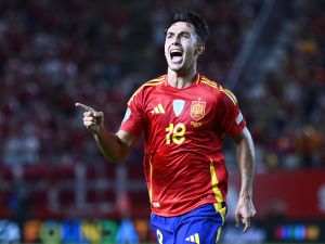 Spain's midfielder #18 Martin Zubimendi celebrates scoring the opening goal during the UEFA Nations League, league A group 4 football match between Spain and Denmark at Nueva Condomina stadium in Murcia, on October 12, 2024. (Photo by JOSE JORDAN / AFP)